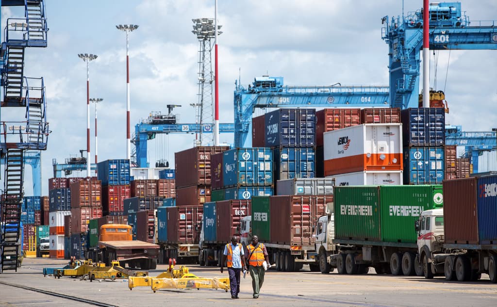 Container yard with trucks and stacked containers at the Port of Mombasa
